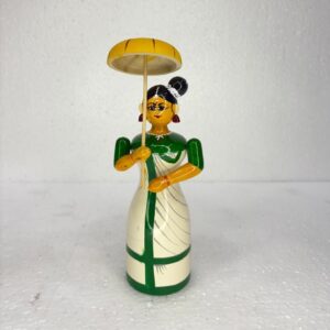 women on white saree with umbrella